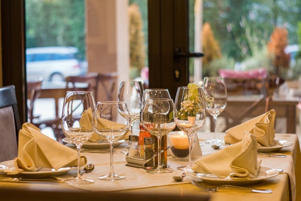 Home 30 a table with wine glasses and food