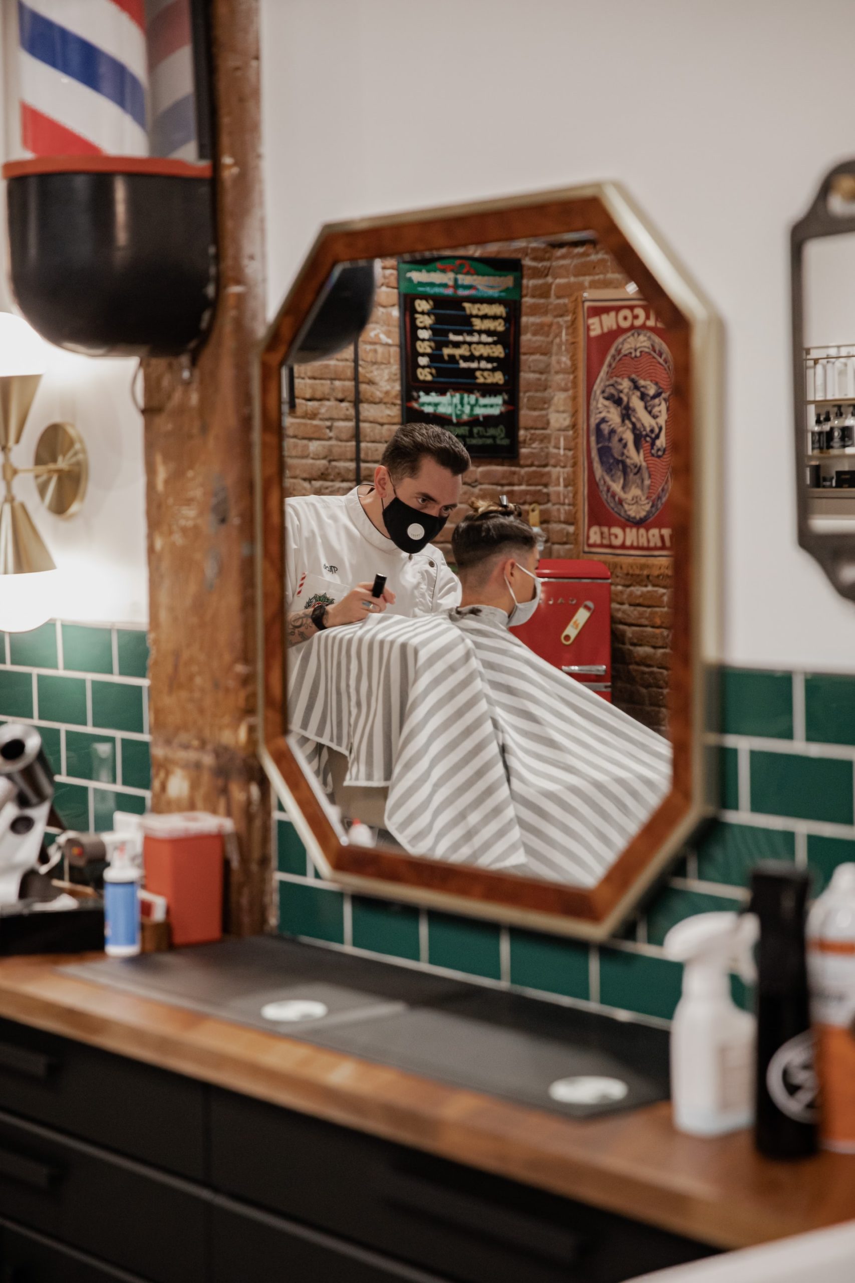 a person taking a picture of himself in a mirror