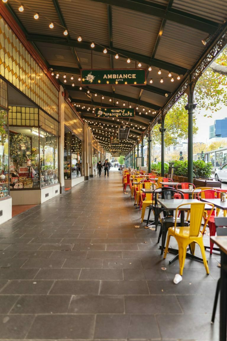 a long row of tables and chairs
